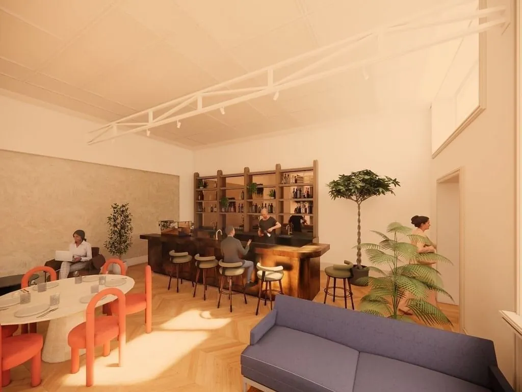 Moderne kantoorruimte aan de Keizersgracht 264 in Amsterdam met bar, zithoeken en een warme, stijlvolle inrichting.