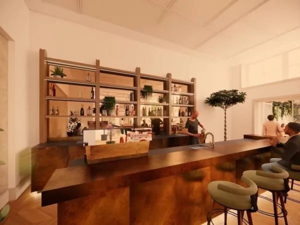 Moderne kantoorruimte aan de Keizersgracht 264 in Amsterdam met een stijlvolle bar en zitgedeelte.