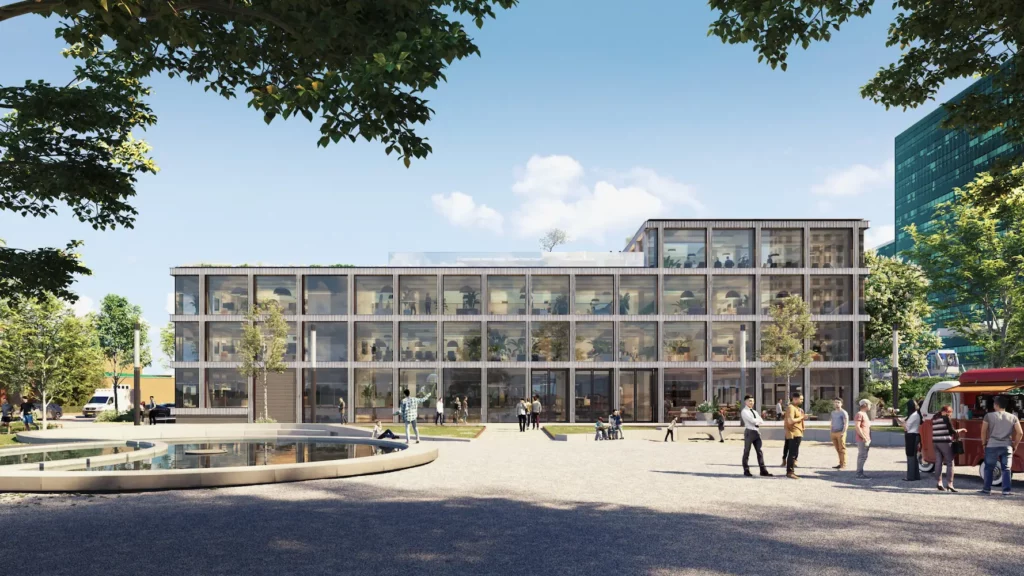 Moderne kantoorruimte aan de Strawinskylaan in Amsterdam-Zuidas, met glazen gevel en levendig plein met mensen en foodtruck op de voorgrond.