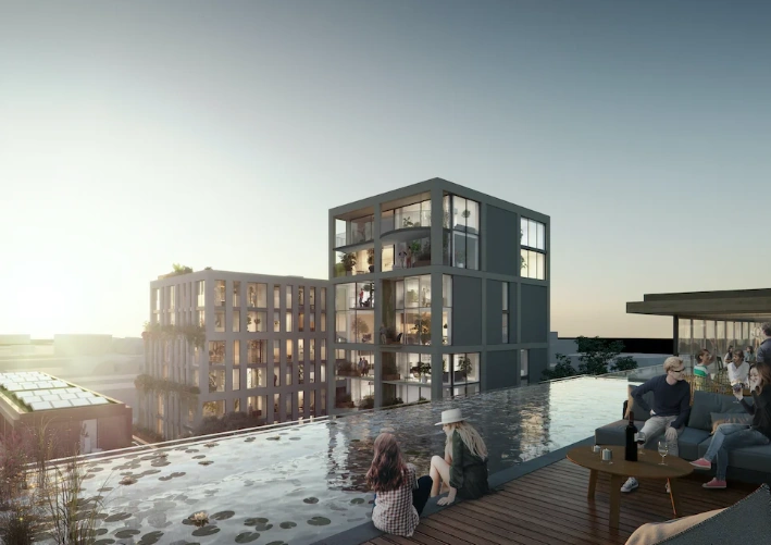 Moderne appartementen aan de Papaverweg 37B met een dakterras en zwembad bij zonsondergang.