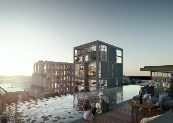 Rooftop zwembad van het Republica Hotel bij zonsondergang met mensen die ontspannen op het terras.