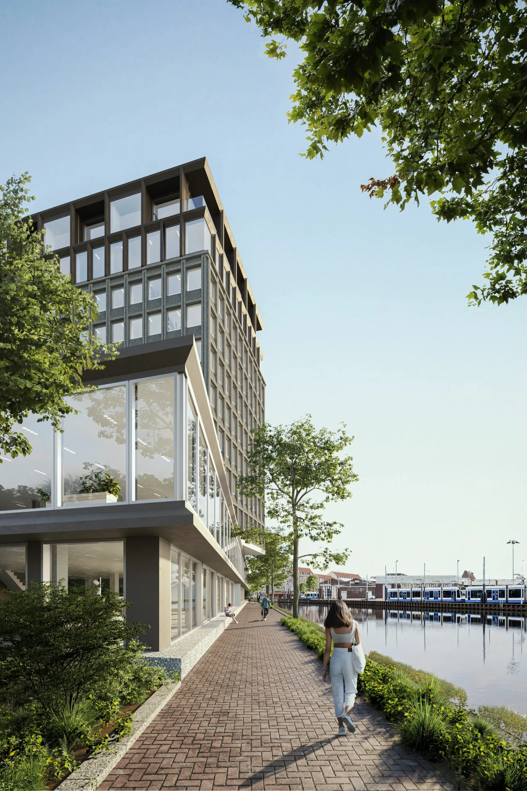 Een moderne woontoren aan de Rijnsburgstraat met uitzicht op het water en een wandelpad langs de kade.