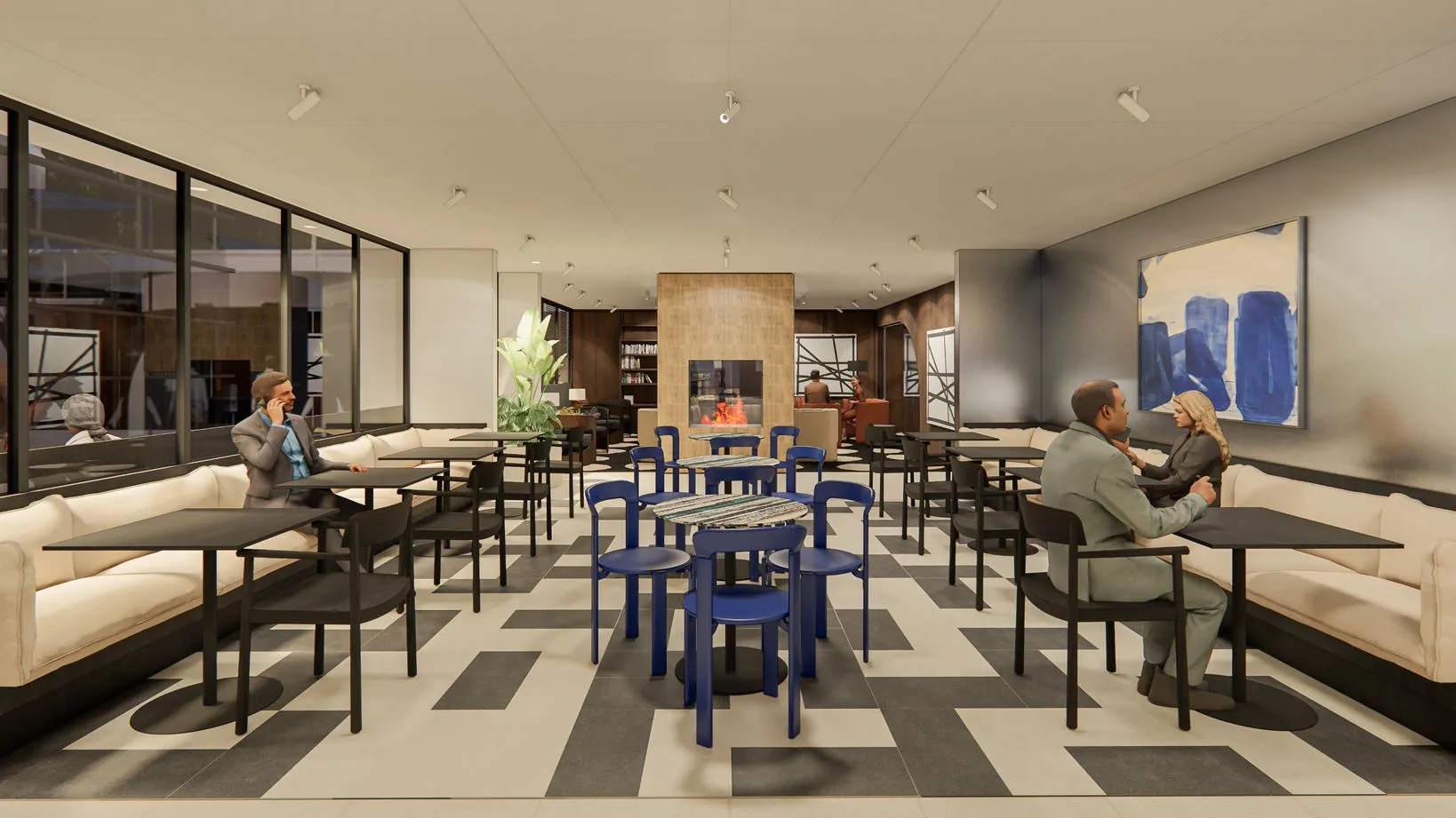 Moderne lounge- en werkruimte in Strawinskylaan 1 met zitplaatsen, een open haard en kunst aan de muur.