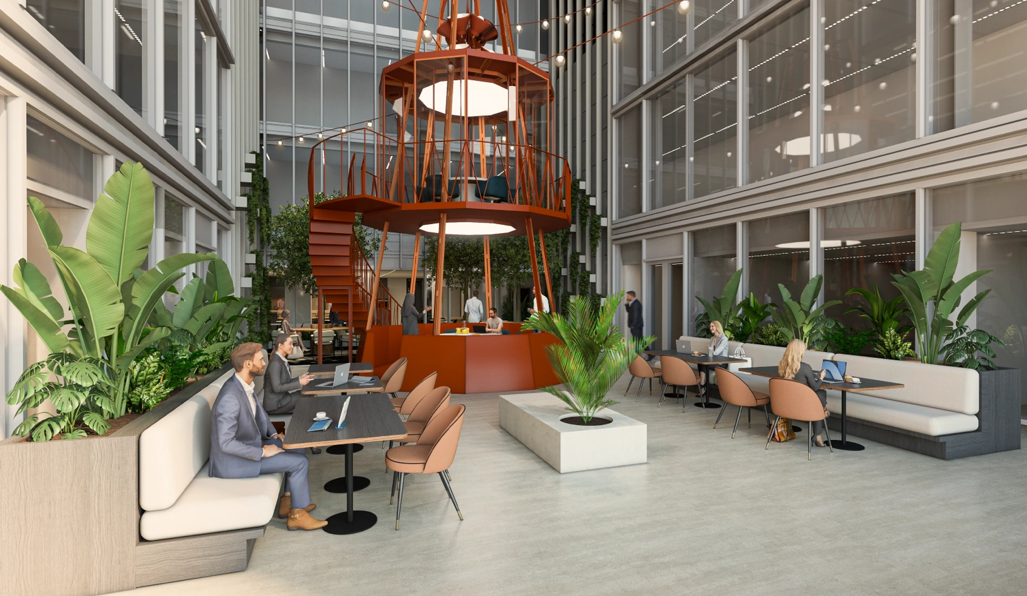 Moderne, open kantoorruimte in Strawinskylaan 3 met zitplekken, veel groen en een opvallende rode trapconstructie.