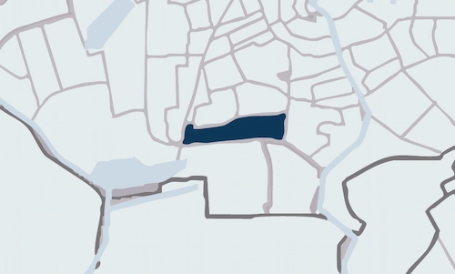 Stylized map highlighting the Zuidas area in dark blue.