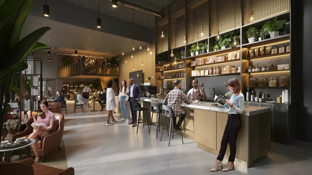 Moderne koffiebar met gezellige zitplekken, waar mensen ontspannen, werken en met elkaar praten.
