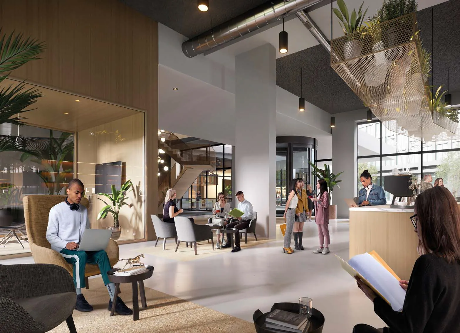 Moderne en levendige lobby van Entree 201 met mensen die werken, lezen en met elkaar in gesprek zijn.