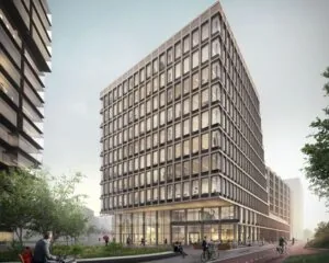 Modern kantoorgebouw aan de Galrestraat 30 in Amsterdam met glazen gevel en omliggende fietsers en voetgangers.