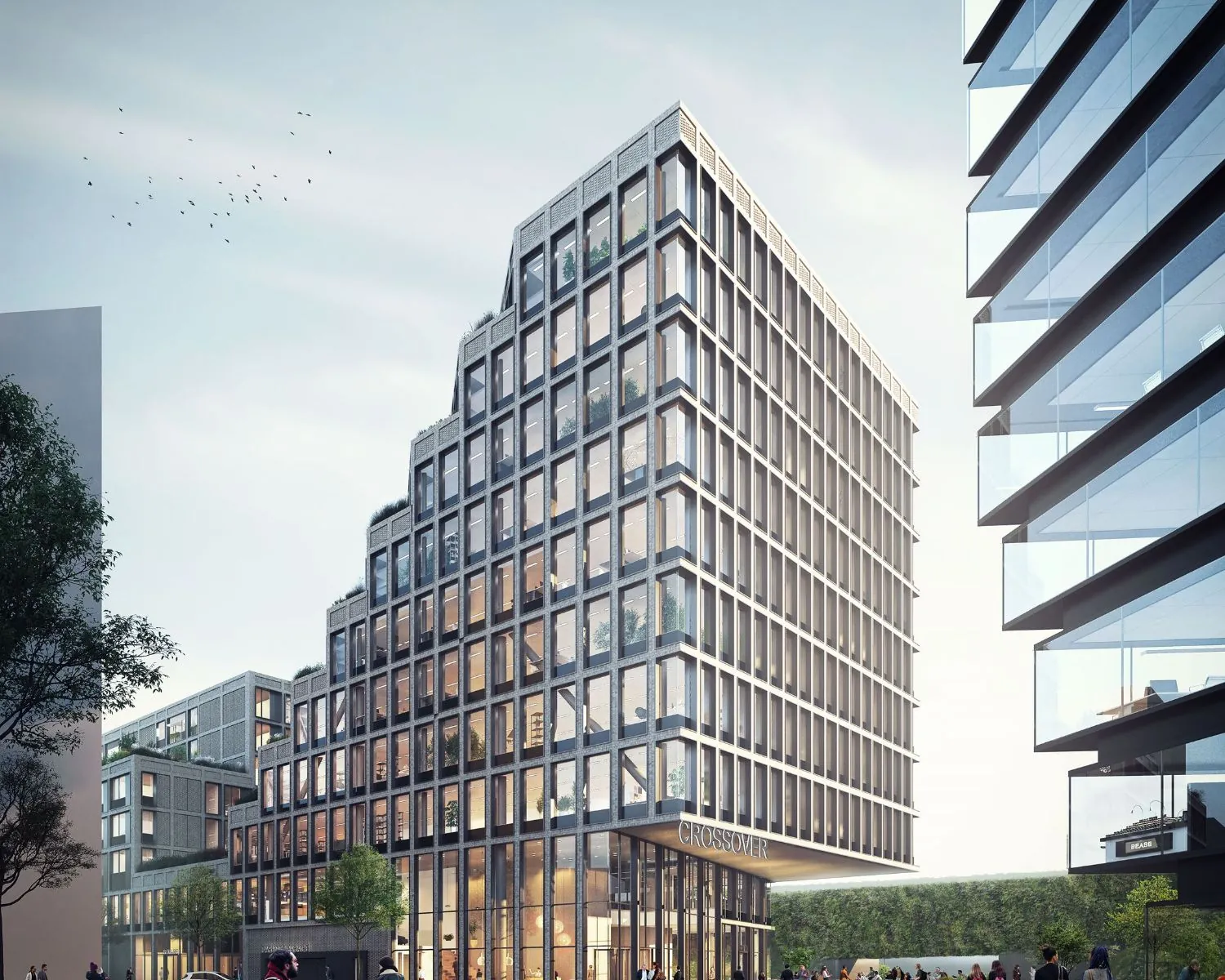 Modern kantoorgebouw aan de Galrestraat 30 in Amsterdam met glazen gevel en terrassen op meerdere niveaus.