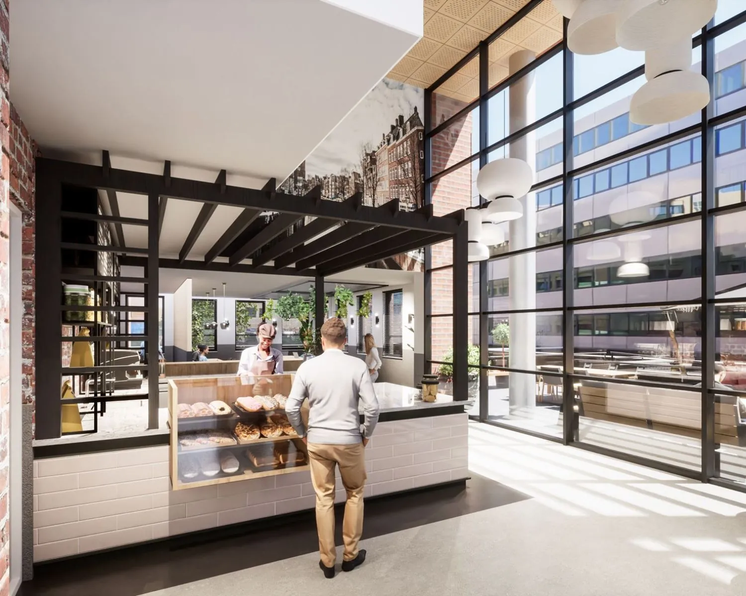 Moderne kantoorruimte met een koffie- en lunchbar in een lichte, open ruimte aan de Hogehilweg 24.