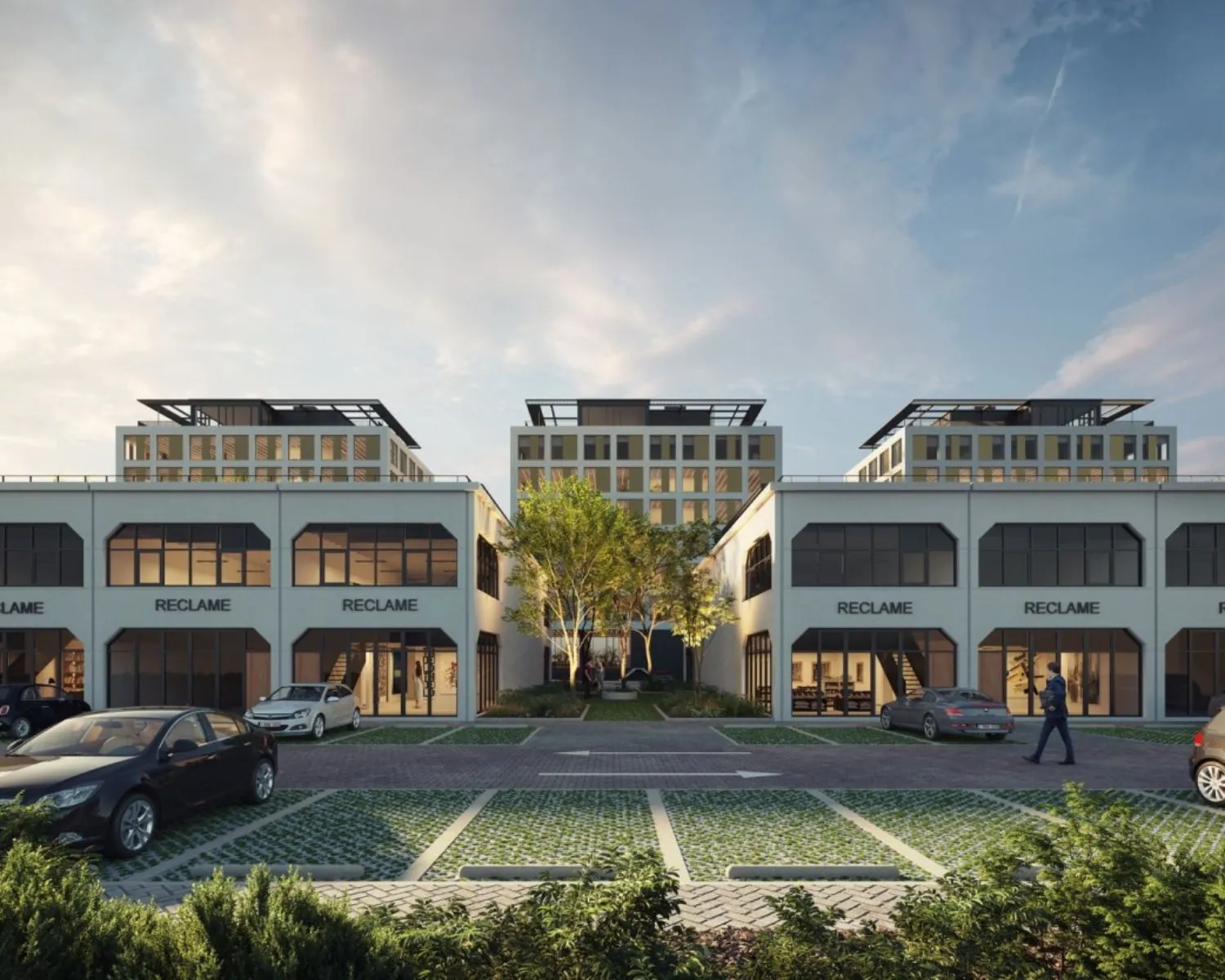 Moderne kantoorruimte aan de Jan van Krimpenweg 1-1 met grote ramen, parkeerplaatsen en groenvoorziening.