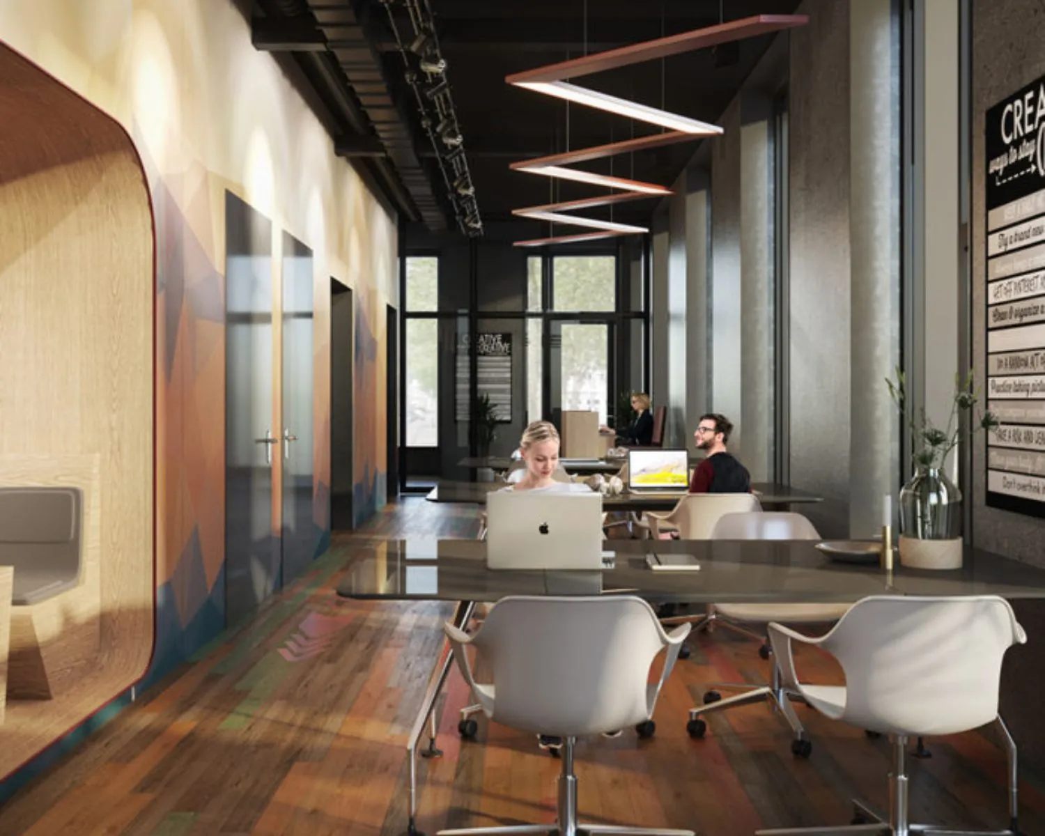 Moderne kantoorruimte aan de Oostenburgermiddagstraat 601 met open werkplekken, glazen wanden en een warme houten vloer.