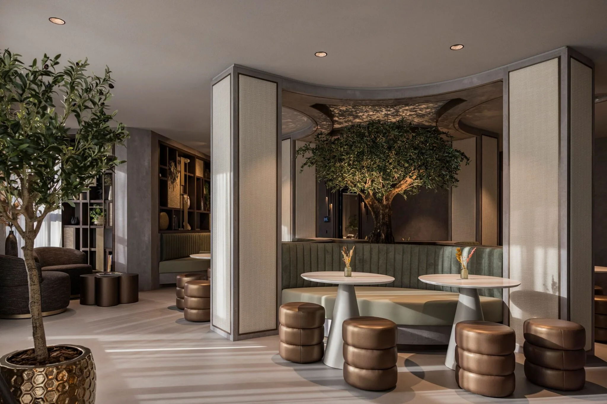 Moderne lounge in kantoorruimte Walborg 2 in Amsterdam met ronde zitjes, groene accenten en een grote boom als eyecatcher.