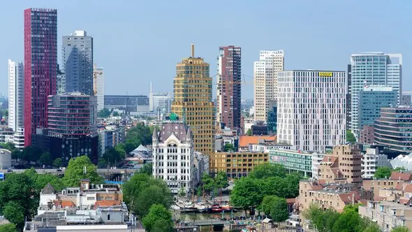 Skyline of Rotterdam city center with modern high-rise buildings and the historic White House.
